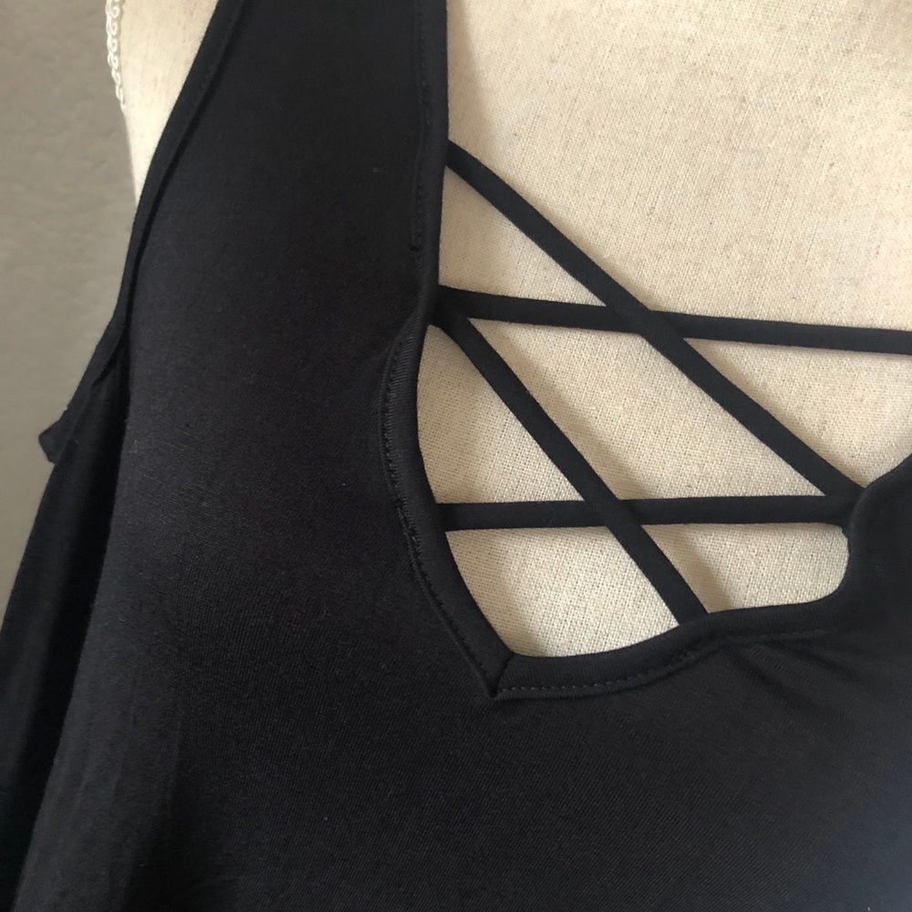 Black long sleeve shirt with shoulder cut outs